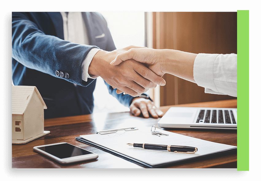 Image of two men shaking hands.